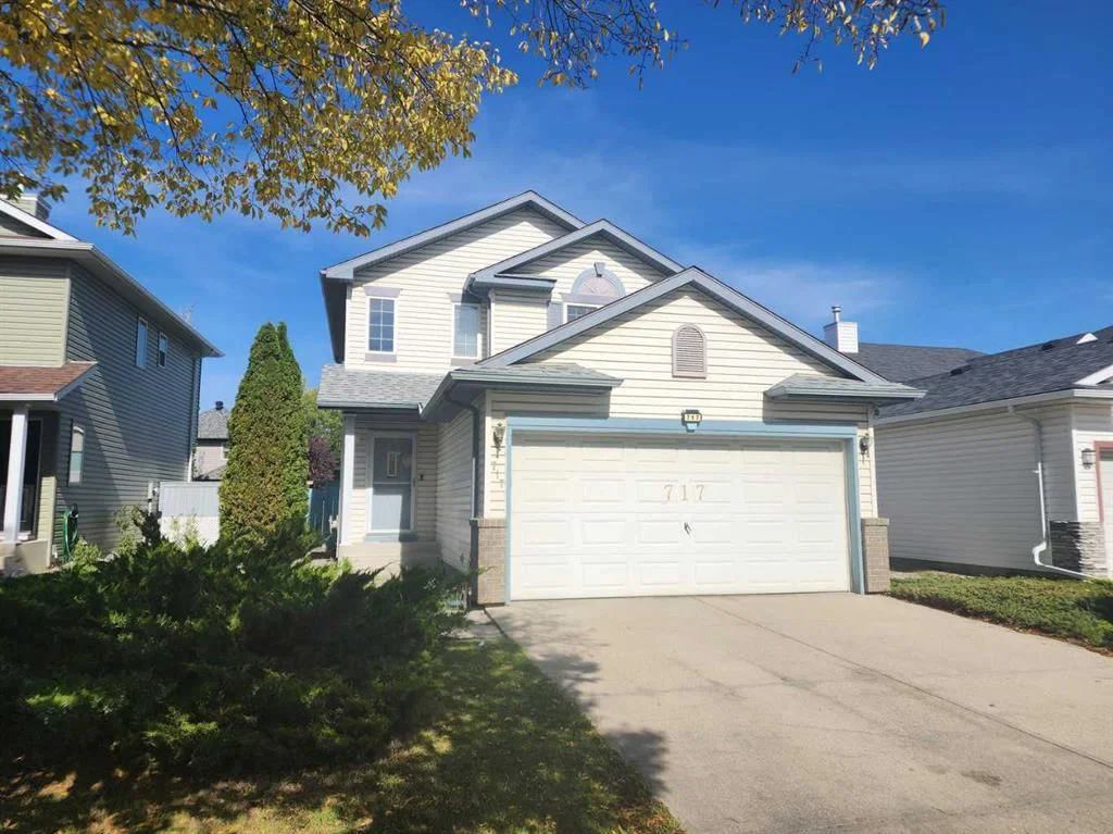 717 Harvest Hills Drive NE, Calgary — main listing photo