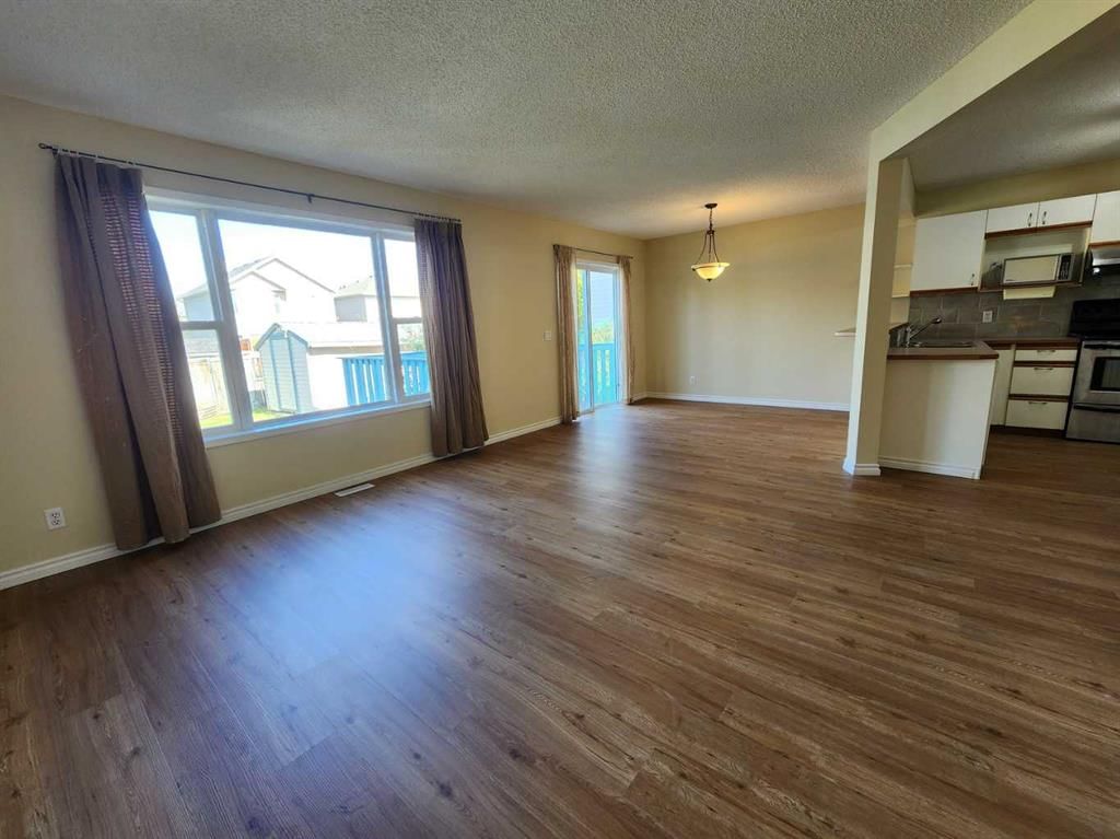 717 Harvest Hills Drive NE, Calgary — photo 4 of 39