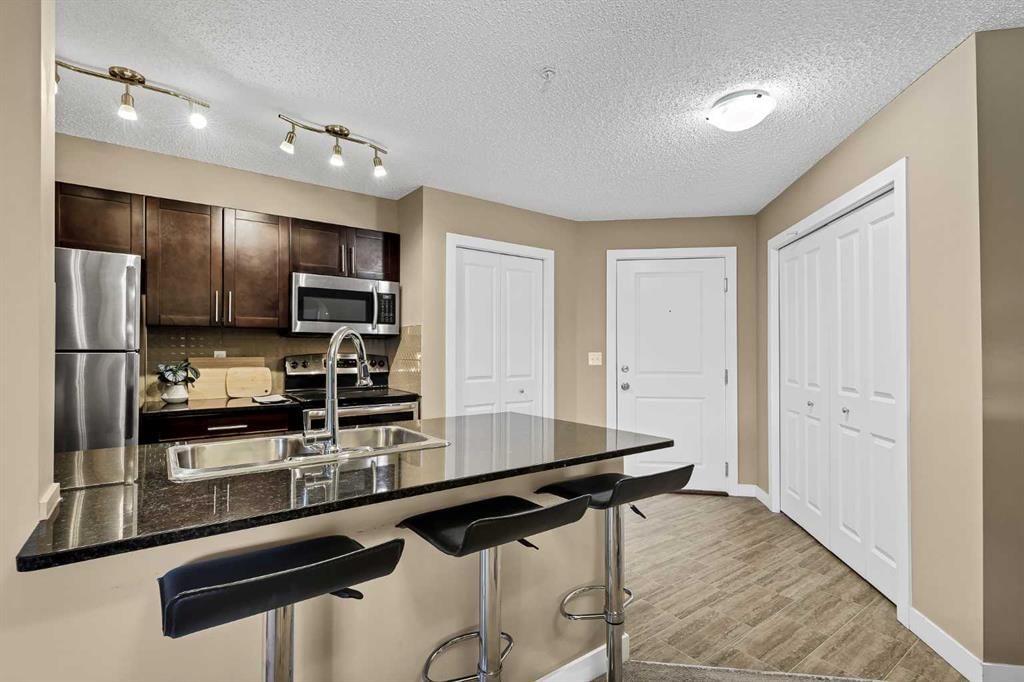 209, 15 Saddlestone Way NE, Calgary — photo 5 of 33