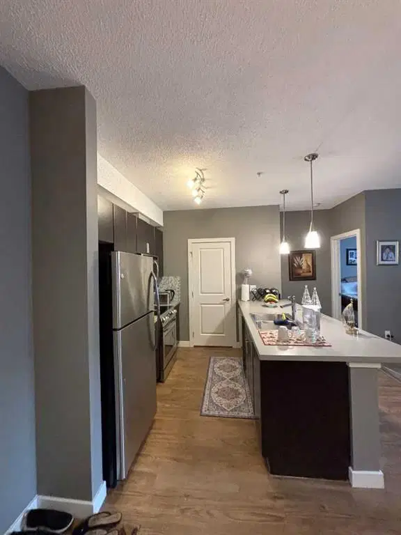 212, 11 Millrise Drive SW, Calgary — photo 5 of 39