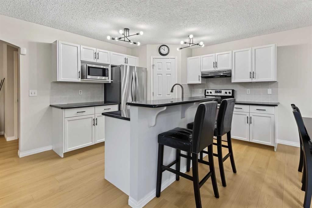 16 Evansbrooke Rise NW, Calgary — photo 4 of 46