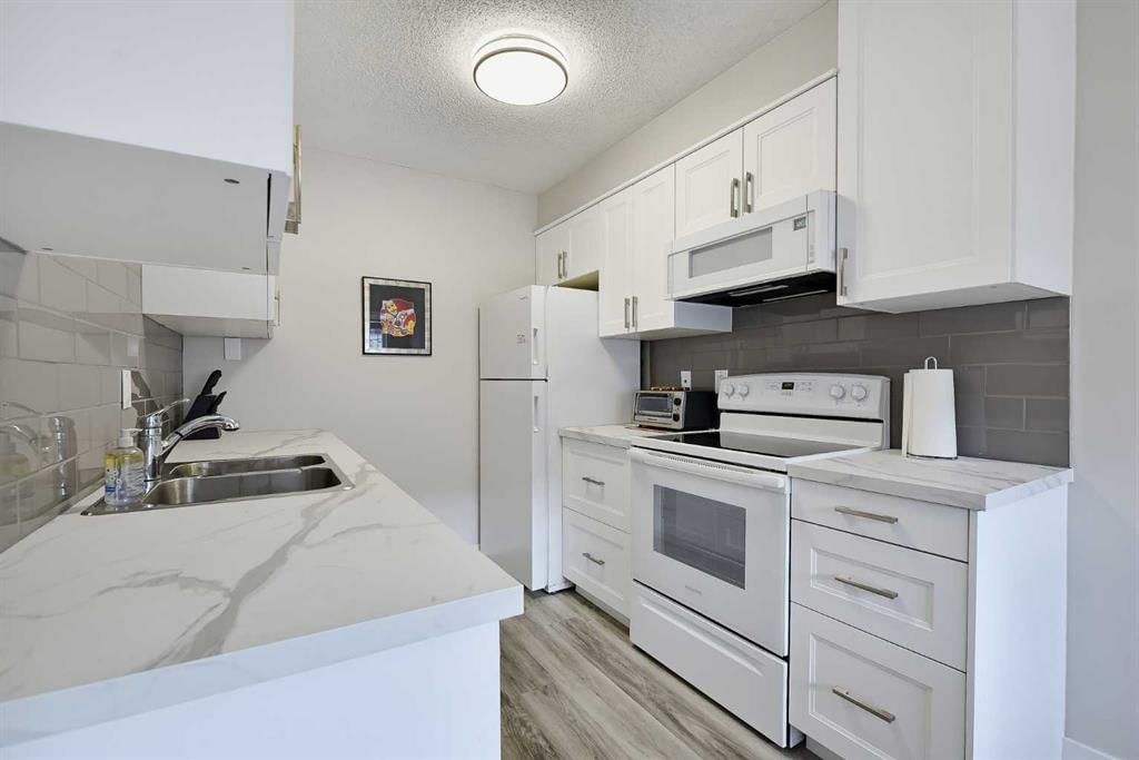 201, 617 56 Avenue SW, Calgary — photo 3 of 25