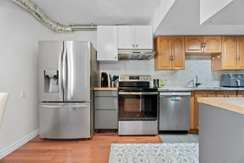302, 9930 Bonaventure Drive SE, Calgary — photo 2 of 46
