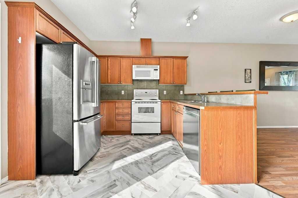 303, 2005 Luxstone Boulevard SW, Airdrie — photo 4 of 31