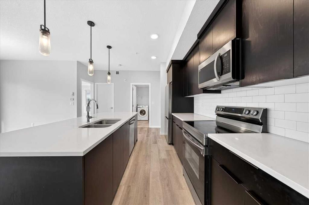 1202, 220 Seton Grove SE, Calgary — photo 3 of 48