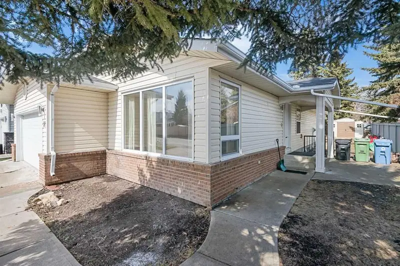 51 Woodmont Road SW, Calgary — photo 2 of 45