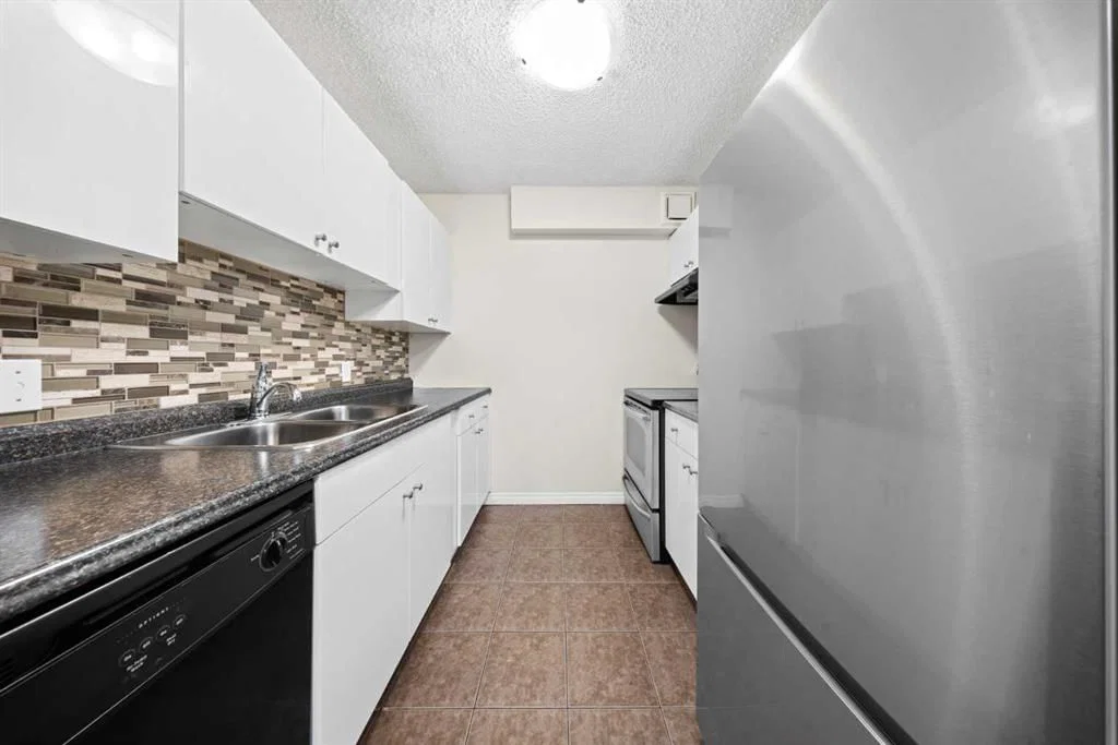 305, 718 12 Avenue SW, Calgary — main listing photo