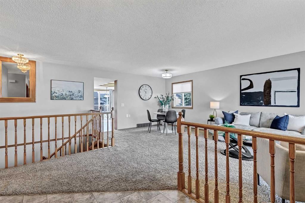 39 Woodside Close NW, Airdrie — photo 3 of 49