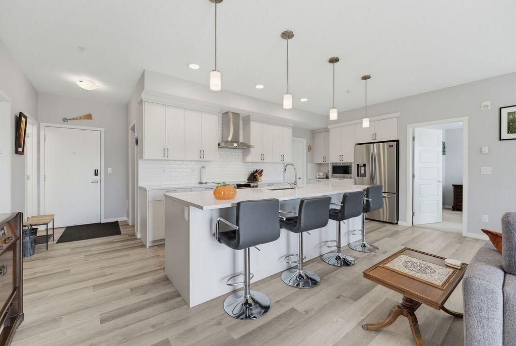 204, 300 Harvest Hills Place NE, Calgary — photo 2 of 35