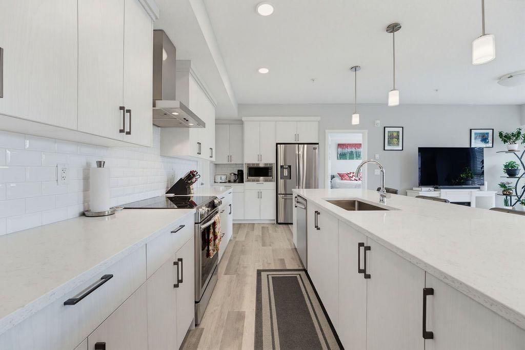 204, 300 Harvest Hills Place NE, Calgary — photo 4 of 35