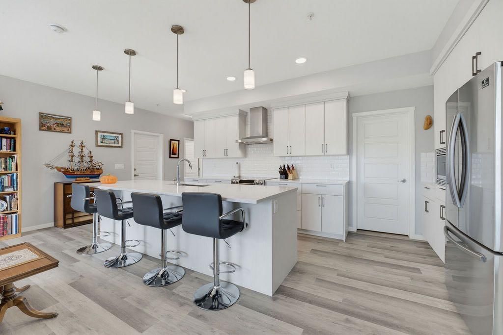 204, 300 Harvest Hills Place NE, Calgary — photo 5 of 35