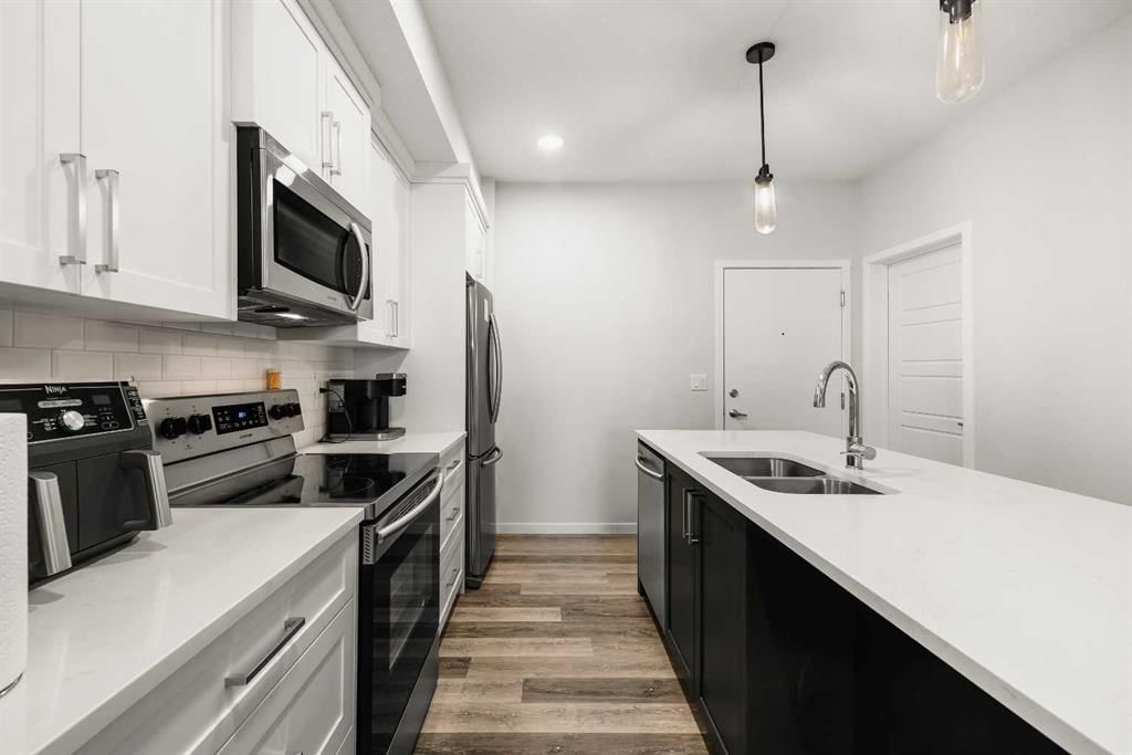 112, 300 Harvest Hills Place NE, Calgary — photo 4 of 22