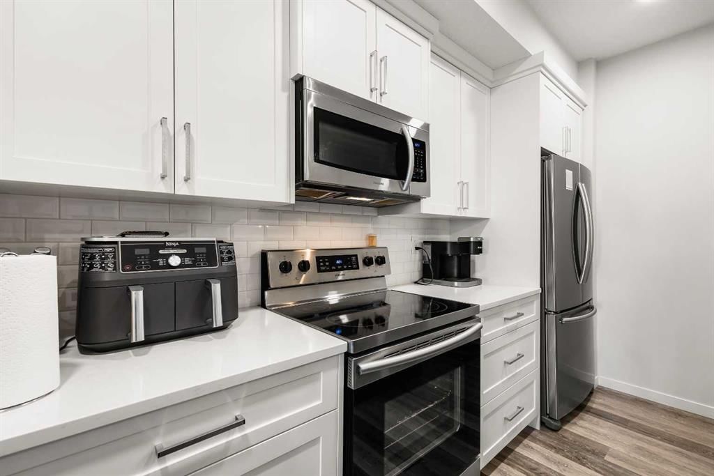112, 300 Harvest Hills Place NE, Calgary — photo 5 of 22