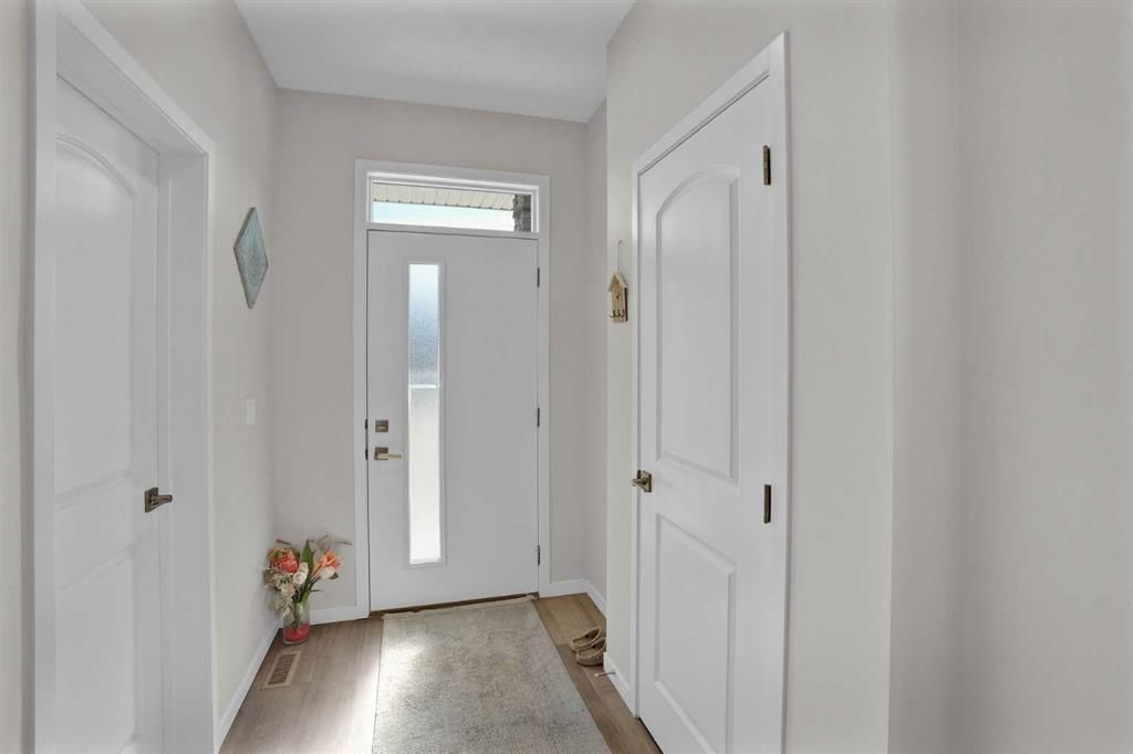 143 Dawson Wharf Rise, Chestermere — photo 3 of 47