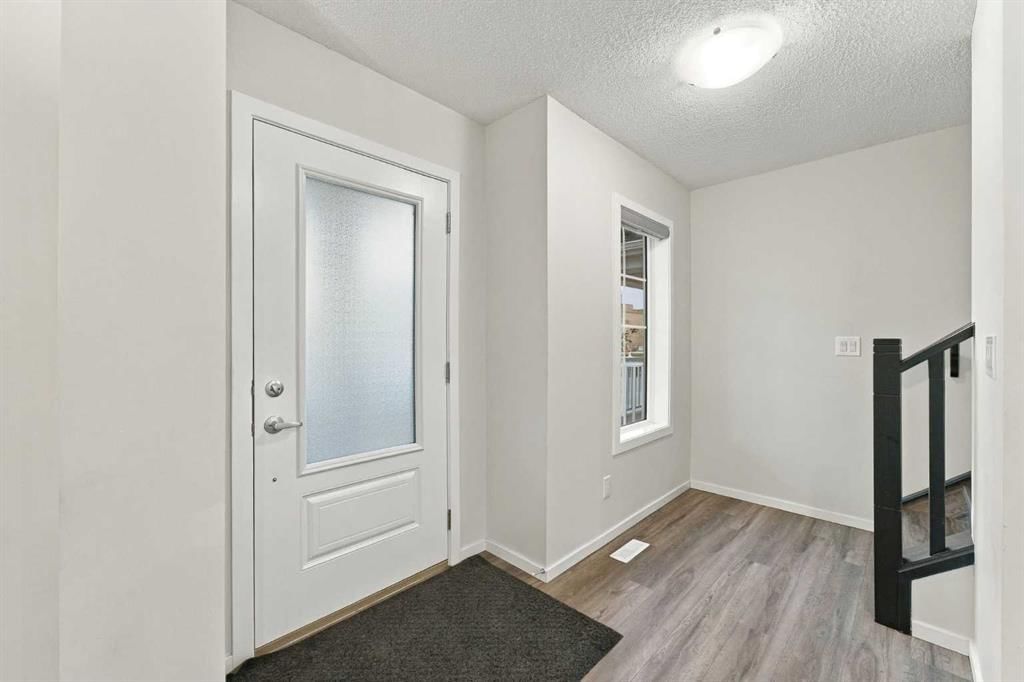5006 Windsong Boulevard SW, Airdrie — photo 4 of 34