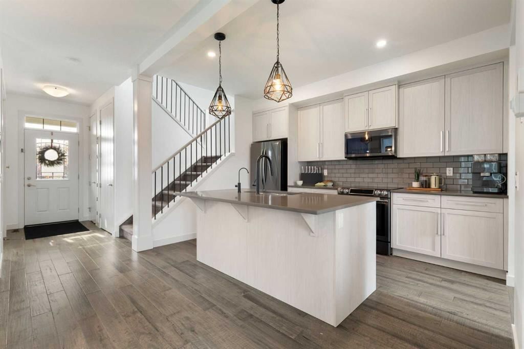 416 Coopers Boulevard SW, Airdrie — photo 2 of 50