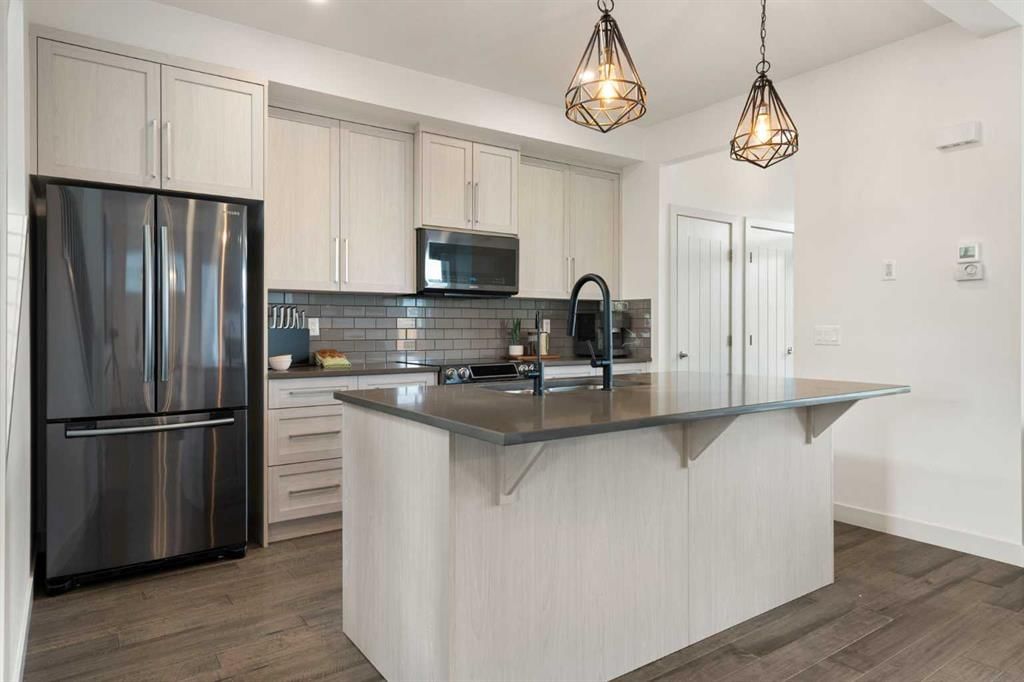416 Coopers Boulevard SW, Airdrie — photo 3 of 50