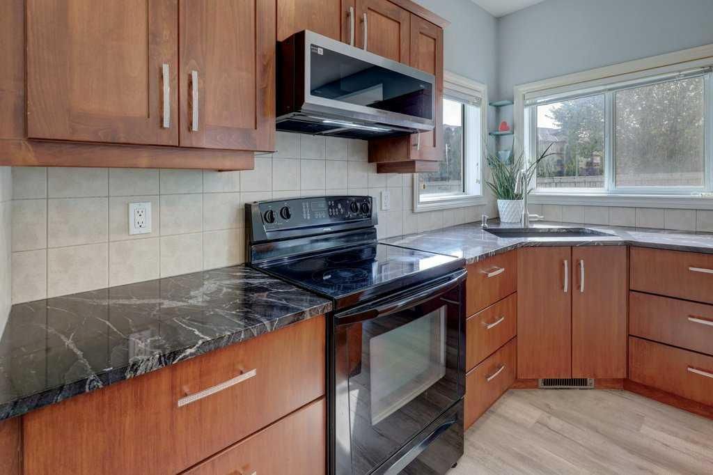 242 Crystal Green Point, Okotoks — photo 4 of 32