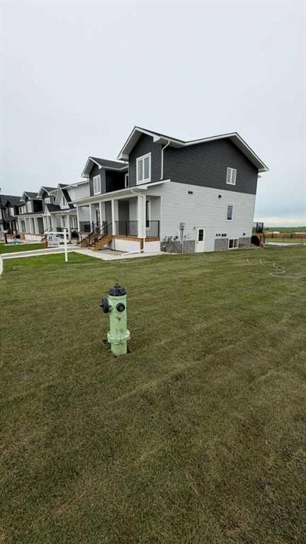 1903 Mccaskill Drive, Crossfield — photo 3 of 11
