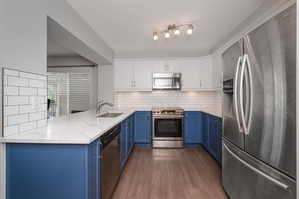 4044 Windsong Boulevard SW, Airdrie — photo 4 of 30