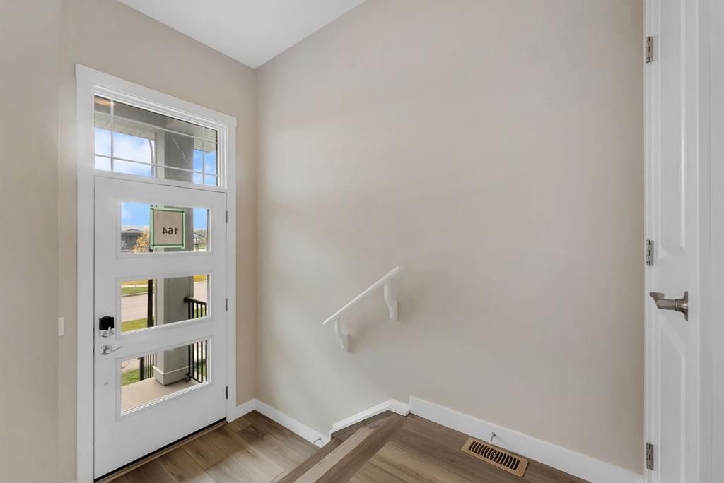 164 Rowmont Boulevard NW, Calgary — photo 3 of 50