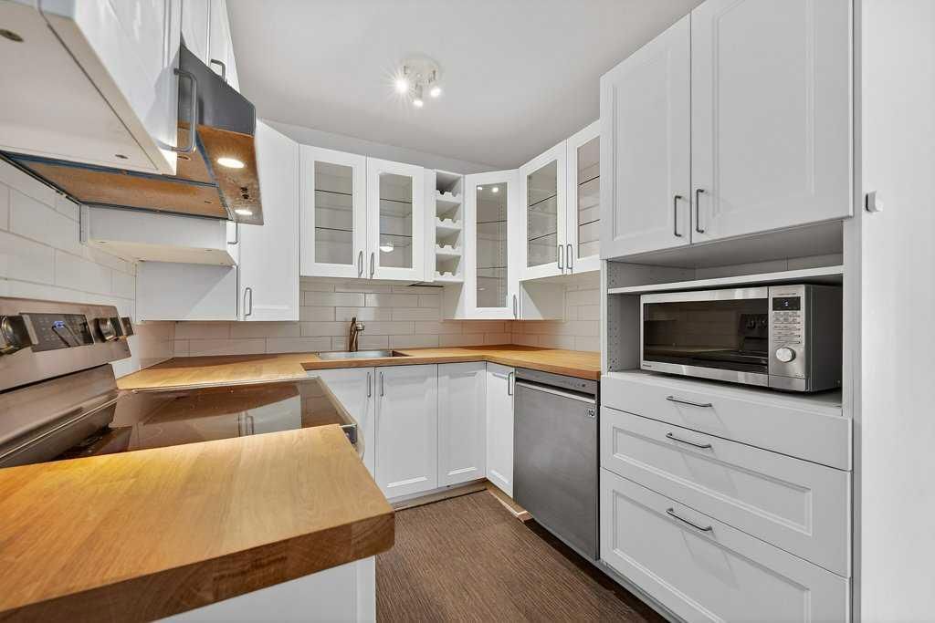 202A, 5601 Dalton Drive NW, Calgary — photo 3 of 33