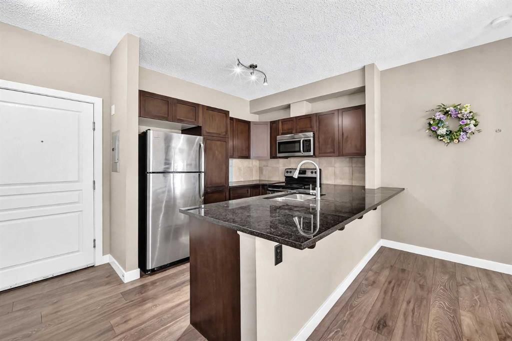 106, 76 Panatella Road NW, Calgary — photo 4 of 31