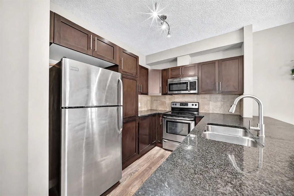 106, 76 Panatella Road NW, Calgary — photo 5 of 31