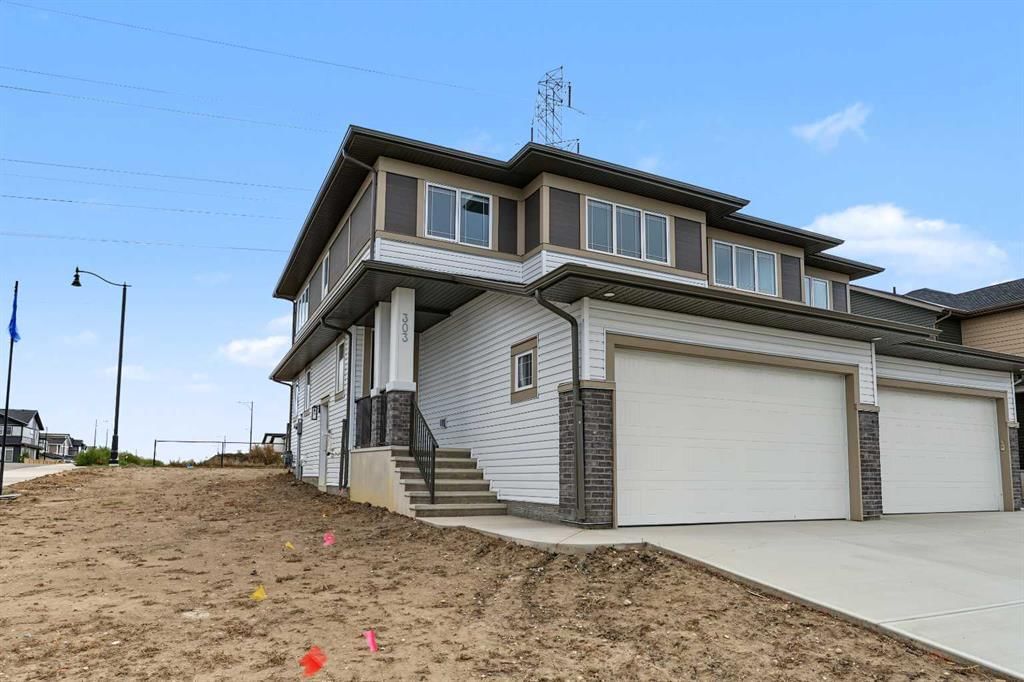 303 Dawson Dock Way, Chestermere — photo 2 of 36