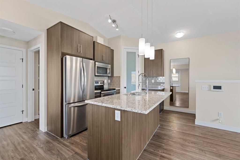 1921, 2461 Baysprings Link SW, Airdrie — photo 3 of 31