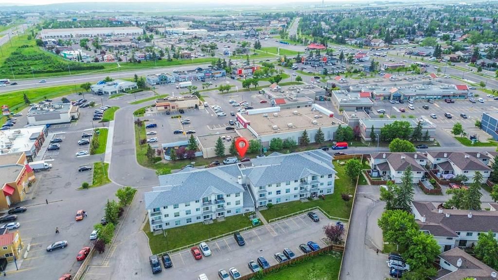 103, 5555 FALSBRIDGE Drive NE, Calgary — photo 3 of 37