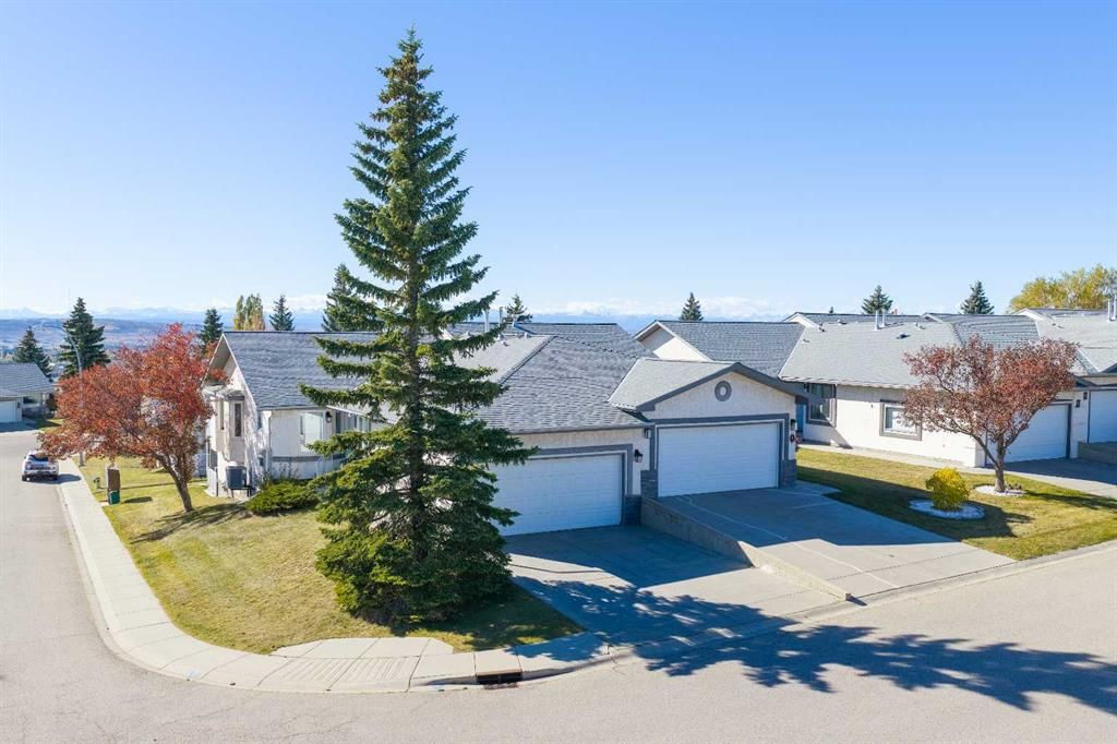 4 ARBOUR CLIFF Court NW, Calgary — main listing photo