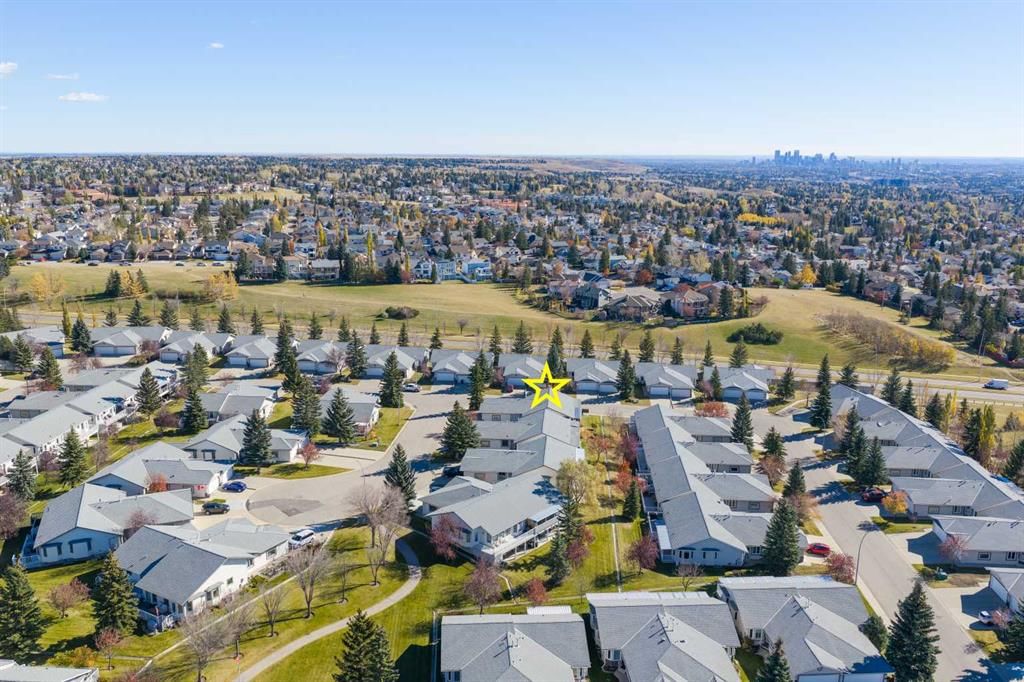 4 ARBOUR CLIFF Court NW, Calgary — photo 5 of 44
