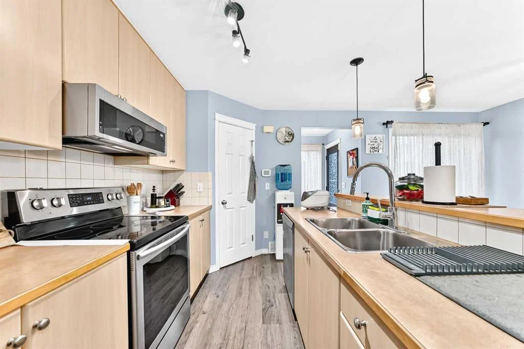 1037 New Brighton Gardens SE, Calgary — photo 5 of 49