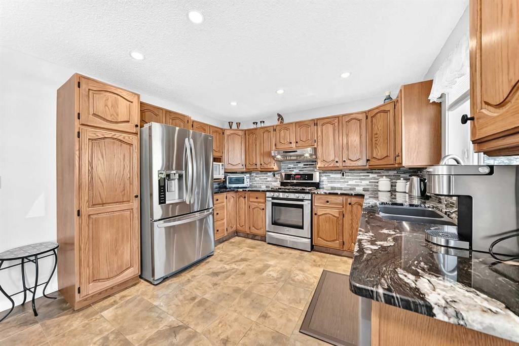 132 Millrise Drive SW, Calgary — photo 4 of 50