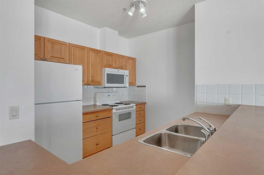 2222, 1010 Arbour Lake Road NW, Calgary — photo 5 of 41