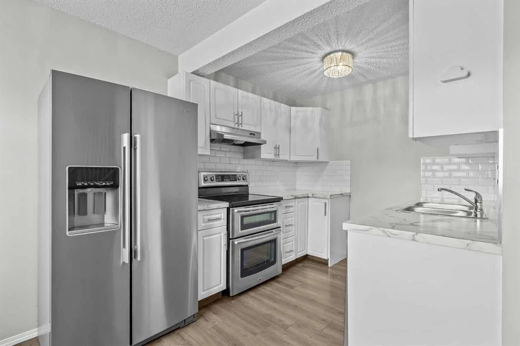 15, 6100 4 Avenue NE, Calgary — photo 4 of 37